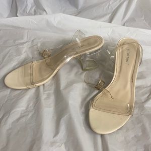 Clear straps block heels